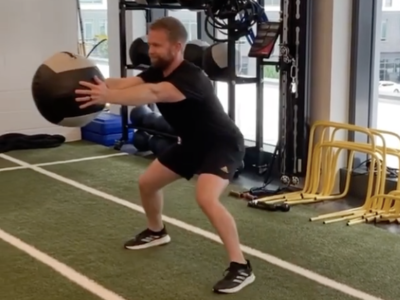 Wide Stance Lateral Push w/ Med Ball